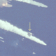 An detail of a photo following the explosion shows the intact crew cabin beginning its three-minute descent. Investigators believe that the crew survived the explosion, only to die when the crew cabin struck the ocean. (NASA)
